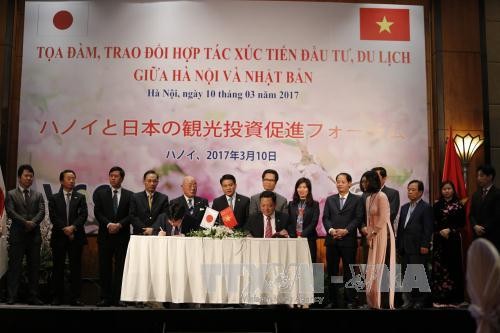 Sarasehan kerjasama promosi investasi, pariwisata antara kota Hanoi dan Jepang - ảnh 1
