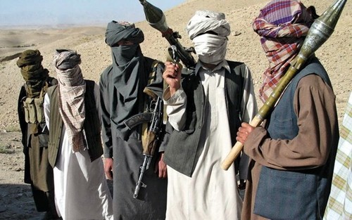  Taliban melakukan serangan terhadap pangkalan militer sehingga menimbulkan puluhan korban - ảnh 1