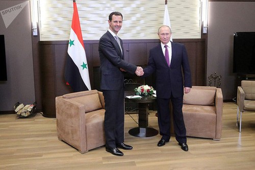  Presiden Suriah dan Presiden Rusia berbahas tentang proses menghentikan bentrokan di Suriah - ảnh 1