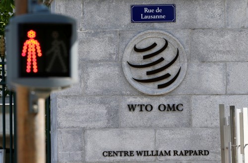 Donald Trump threatens to pull US out of WTO - ảnh 1