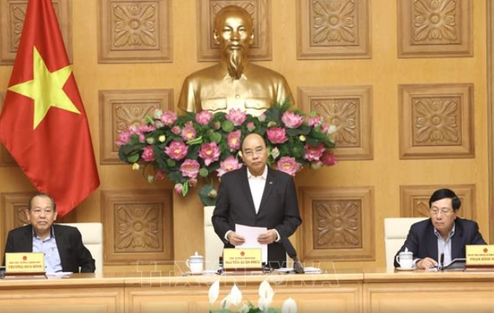 Prime Minister orders fighting Covid-19 and developing economy  - ảnh 1