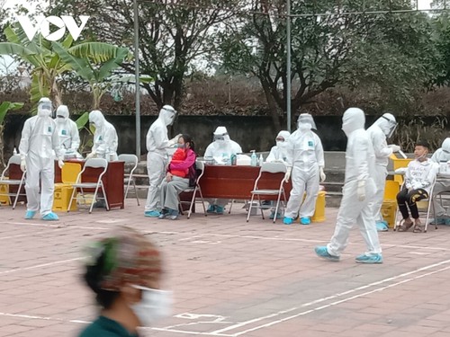 Two community infection cases of COVID-19 detected, government convenes emergency meeting  - ảnh 2