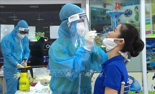 Vietnam records 16,000 more cases of COVID-19, 133 Omicron cases  - ảnh 1