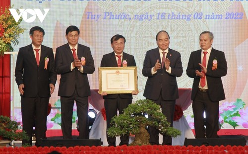 President applauds Tuy Phuoc district for meeting new rural area standards - ảnh 1