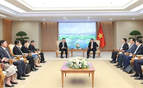 Prime Minister receives Lao Minister of Industry and Trade  - ảnh 1