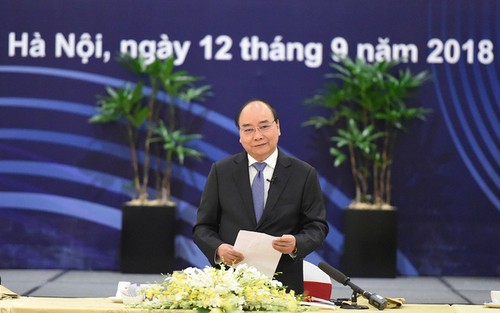越南政府总理阮春福对世界大型集团承诺在越长期经营表示欢迎 - ảnh 1