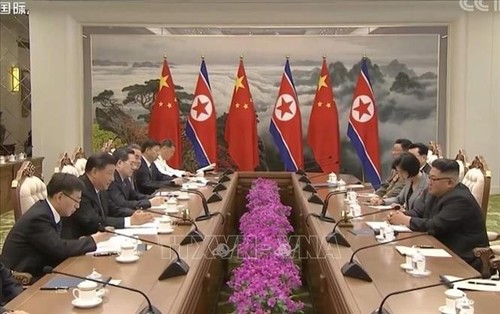 中朝两国领导人一致同意共同开创两党两国关系的美好未来 - ảnh 1