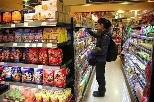 过半中国消费者因贸易战而避免购买美国商品 - ảnh 1