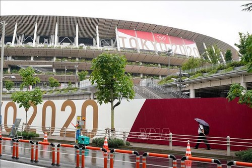 日本与国际奥林匹克委员会决心成功举办2020年东京奥运会 - ảnh 1