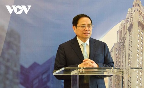 Премьер-министр Фам Минь Тинь принял участие в церемонии открытия офиса FPT в Нью-Йорке, США - ảnh 1