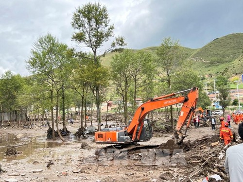 Возросло число погибших в результате наводнения в Китае  - ảnh 1