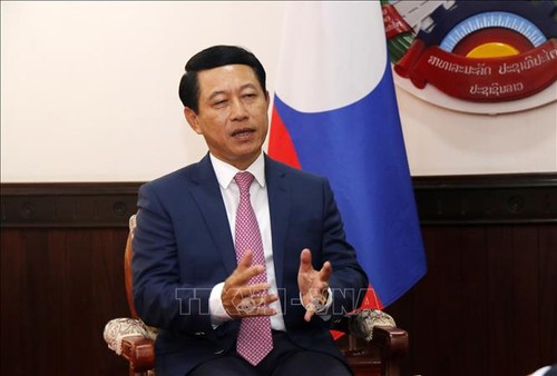 Визит премьер-министра Вьетнама Фам Минь Тиня имеет важное значение для отношений сотрудничества между Лаосом и Вьетнамом  - ảnh 1