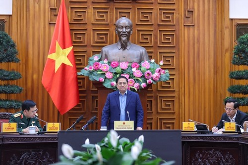 Премьер-министр Фам Минь Чинь председательствовал на первом заседании по подведению итогов работы руководящего комитета по вопросам гражданской обороны 2022 года   - ảnh 1
