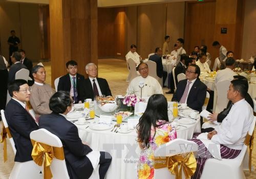 Party leader meets Vietnamese, Myanmar businesses - ảnh 1