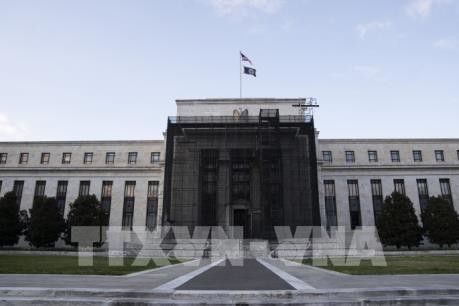 Federal Reserve cuts interest rate to near zero in response to Covid-19 - ảnh 1
