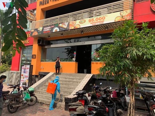 Hanoi's Nam Tu Liem district disinfected following suspected positive COVID-19 case - ảnh 8