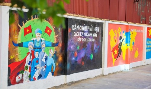 Murals in Hanoi convey message of fighting Covid-19 - ảnh 1