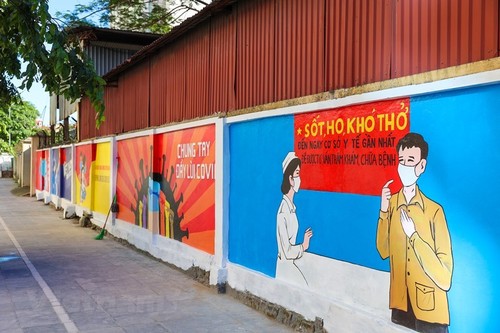 Murals in Hanoi convey message of fighting Covid-19 - ảnh 5