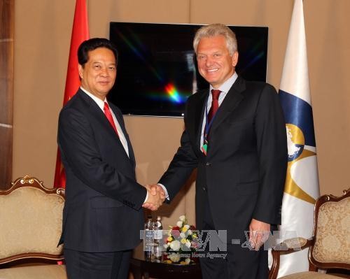 Thủ tướng Nguyễn Tấn Dũng gặp các nhà lãnh đạo thành viên Liên minh kinh tế Á-Âu - ảnh 1