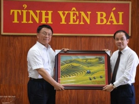 Việt Nam và Trung Quốc chia sẽ kinh nghiệm trong lĩnh vực phát triển kinh tế vùng đồng bào dân tộc - ảnh 1