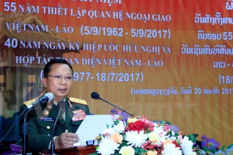 Bộ Quốc phòng Lào mít tinh trọng thể kỷ niệm các ngày lễ lớn của 2 nước - ảnh 1