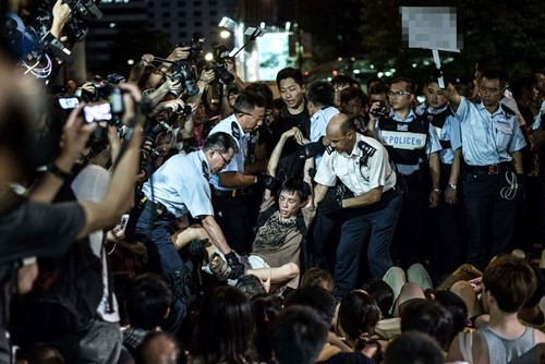 Fuerza de seguridad de Hong Kong arresta a l9 personas - ảnh 1