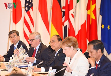 Finaliza el primer ministro vietnamita su visita a Japón y asistencia a la Cumbre ampliada del G7 - ảnh 1