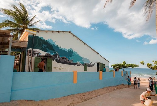 Primera aldea con pintura mural de Vietnam atrae a jóvenes - ảnh 6