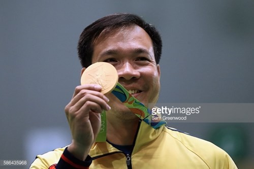 Hoang Xuan Vinh, ganador de la primera medalla olímpica de oro en la historia de Vietnam - ảnh 8