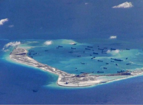 Filipinas acusa a China de construir en secreto islas artificiales  - ảnh 1