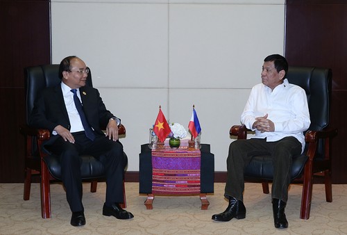 Dirigentes de Vietnam y Filipinas afirman apreciar la cooperación bilateral - ảnh 1