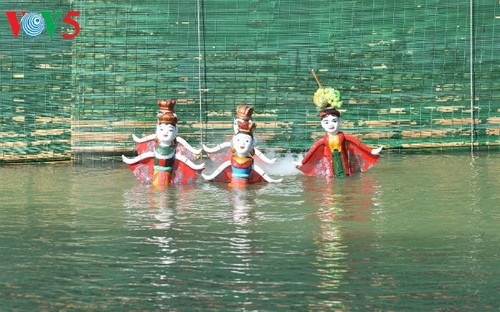 La aldea Dao Thuc y su original arte de las marionetas de agua  - ảnh 2