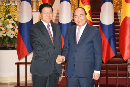 Líder partidista vietnamita se reúne con el primer ministro laosiano  - ảnh 1