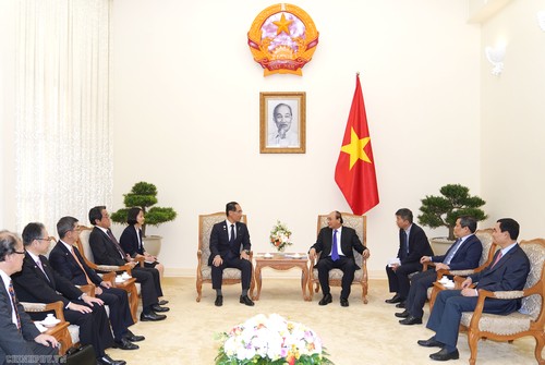 Primer ministro vietnamita destaca cooperación integral con Laos y Japón - ảnh 2