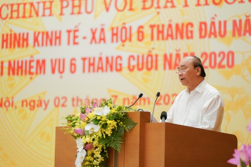 Premier vietnamita pide redoblar esfuerzos para impulsar la recuperación económica - ảnh 1