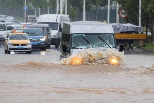 Ministros de Relaciones Exteriores de la Asean emiten Declaración sobre inundaciones en China - ảnh 1