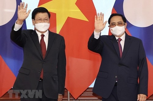 Dirigentes de Vietnam y Laos ratifican el interés de implementar con eficiencia los acuerdos sellados - ảnh 1