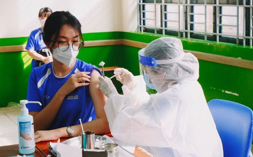 Hanói y otras localidades de Vietnam aceleran la vacunación para niños - ảnh 1
