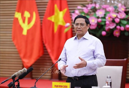 El primer ministro Pham Minh Chinh se reúne con autoridades principales de Nghe An - ảnh 1