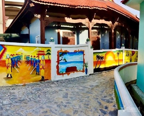 Coloridos murales del pueblo pesquero de Nhon Ly - ảnh 5