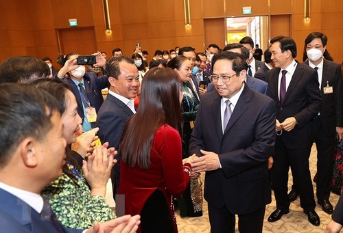 นายกรัฐมนตรีให้การต้อนรับชาวเวียดนามโพ้นทะเล 50 คนที่เข้าร่วมรายการว“สันต์ฤดูในบ้านเกิด“ปี 2022  - ảnh 1