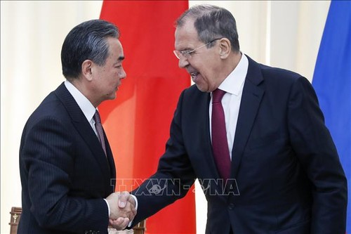 China, Russia oppose unilateralism, protectionism - ảnh 1