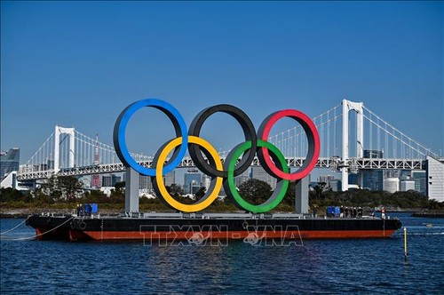 Japan considers limiting Olympics venues to 50% of capacity  - ảnh 1