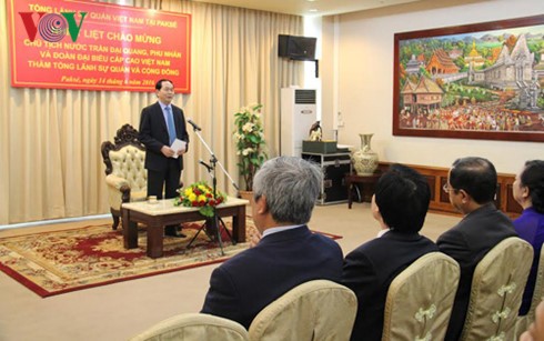  Chủ tịch nước Trần Đại Quang gặp gỡ cộng đồng Việt Nam tại Champasak  - ảnh 1