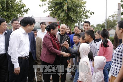 Chủ tịch Quốc hội Nguyễn Thị Kim Ngân dự Ngày hội Đại đoàn kết tại xã Kim Liên, tỉnh Nghệ An - ảnh 1