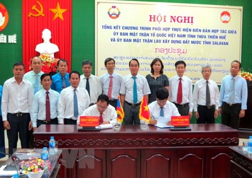 Thúc đẩy hợp tác trong công tác mặt trận giữa các địa phương Việt - Lào  - ảnh 1
