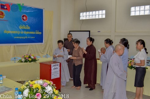 Người Việt Nam tại Lào tiếp tục quyên góp tiền ủng hộ người dân Attapeu - ảnh 1