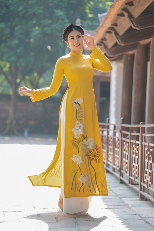 Hoa hậu Ngọc Hân với bộ sưu tập áo dài “Sắc màu phồn vinh" - ảnh 19