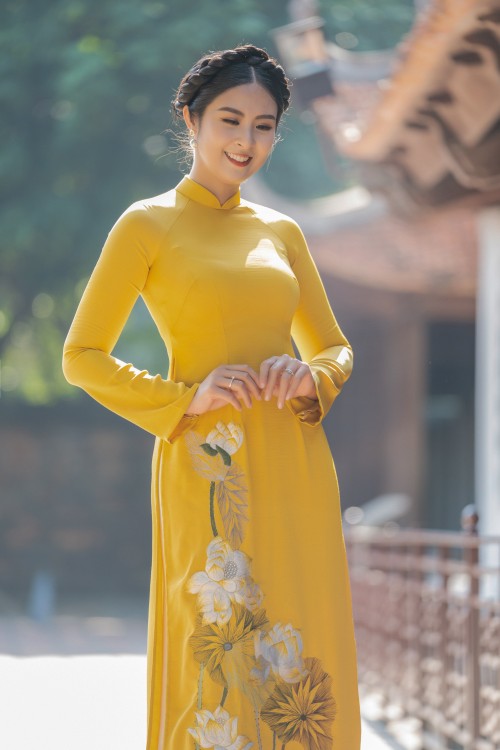 Hoa hậu Ngọc Hân với bộ sưu tập áo dài “Sắc màu phồn vinh" - ảnh 20