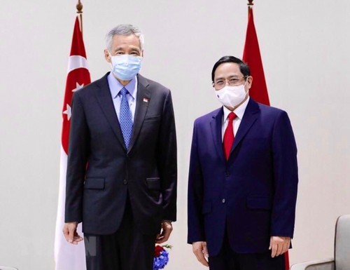 Thủ tướng Phạm Minh Chính tiếp xúc song phương với Thủ tướng Singapore - ảnh 2